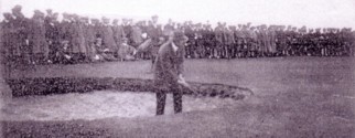 A vintage golf photo of Ted Ray bunkered in the 1912 British Open Championship.