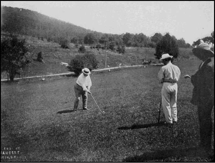 A photo of President Taft playing golf.