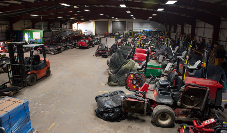 A photo of the inside of the green keeper's barn at St. Sndrews.